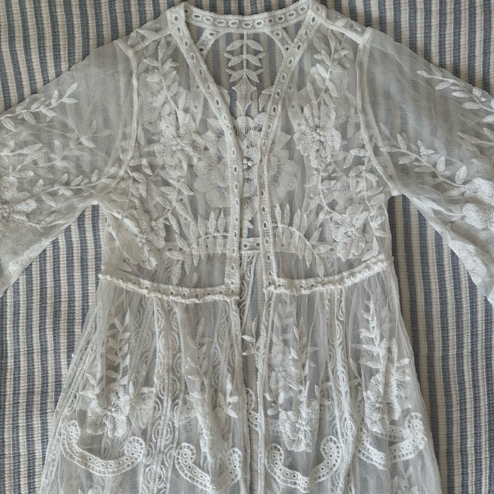 laced bathing suit coverup with adorable scalloped edges boho vibes